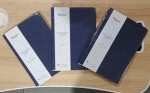 DIARY BLUE COLOUR PRISMA NOTEBOOK A5 MRP 300 RACK G2K3