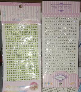 __CRYSTAL BINDI STICKER WHITE N GREEN MRP 45 RACK C4